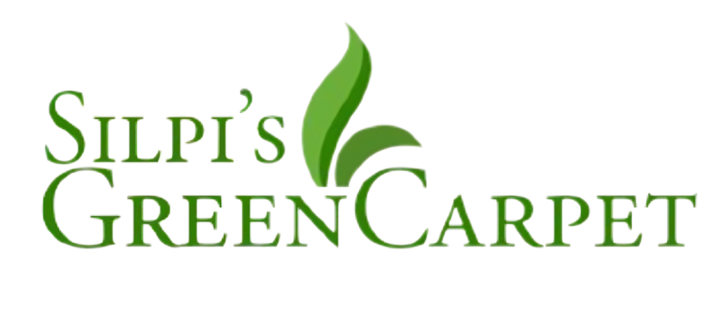 a logo in green color written as Silpi's Green Carpet