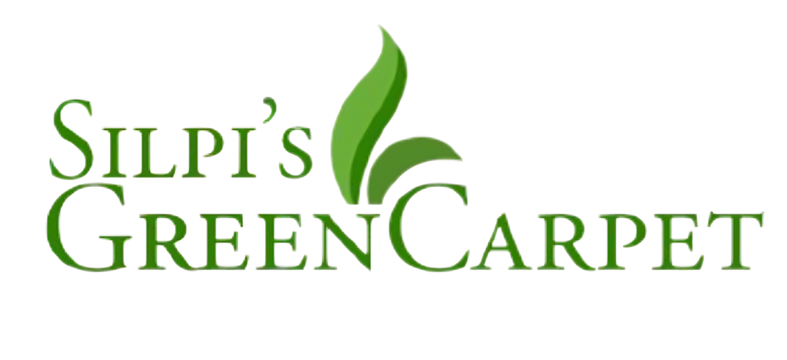 a logo in green color written as Silpi's Green Carpet